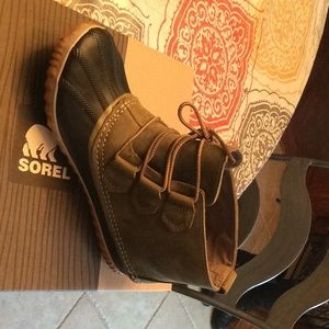 Army green mini Sorel boots